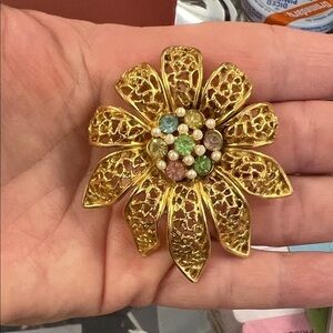 Elegant Gold Floral Brooch with Multicolor Accents